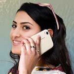 Young-indian-woman-chatting-on-her-cell-phone3