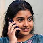 Young-indian-woman-chatting-on-her-cell-phone4